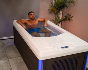 man relaxing in cold tub